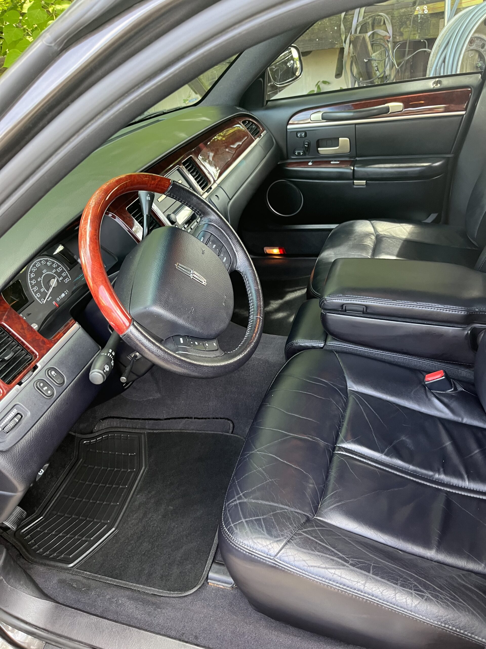 Freshly detailed modern vehicle interior with clean seats and dashboard