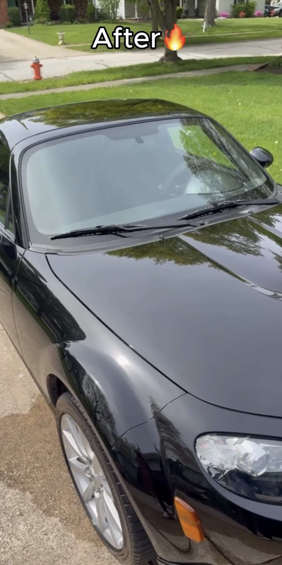 Black roadster after gloss restoration