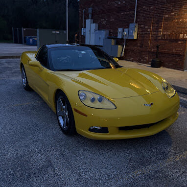 Yellow vehicle after professional paint enhancement